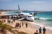 Emergency landing in Mogadishu: StarSky Aviation’s Fokker 50 overran the runway and ended up on the beach, no injuries