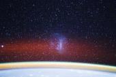 NASA published a photo from the ISS: the Large Magellanic Cloud above Earth’s limb and atmospheric airglow