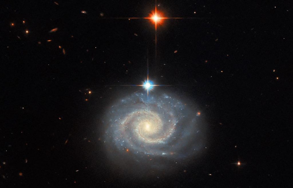 Spiralna galaksija MCG-01-24-014 i tajna 